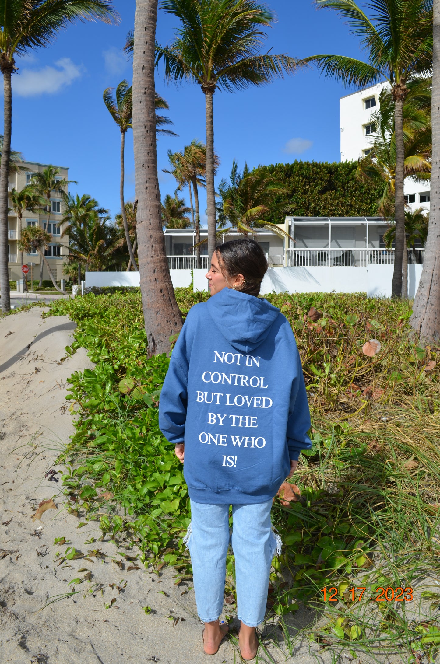 "not in control but loved by the One who is" hoodie in indigo