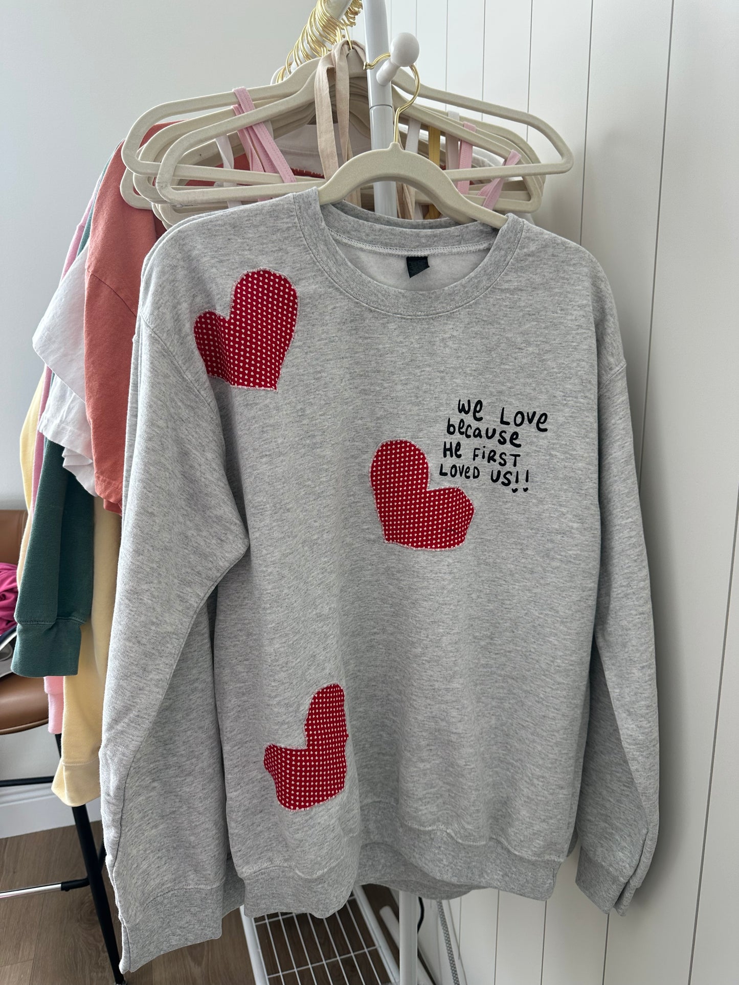 oopsie! "we love because He first loved us" crew in MEDIUM