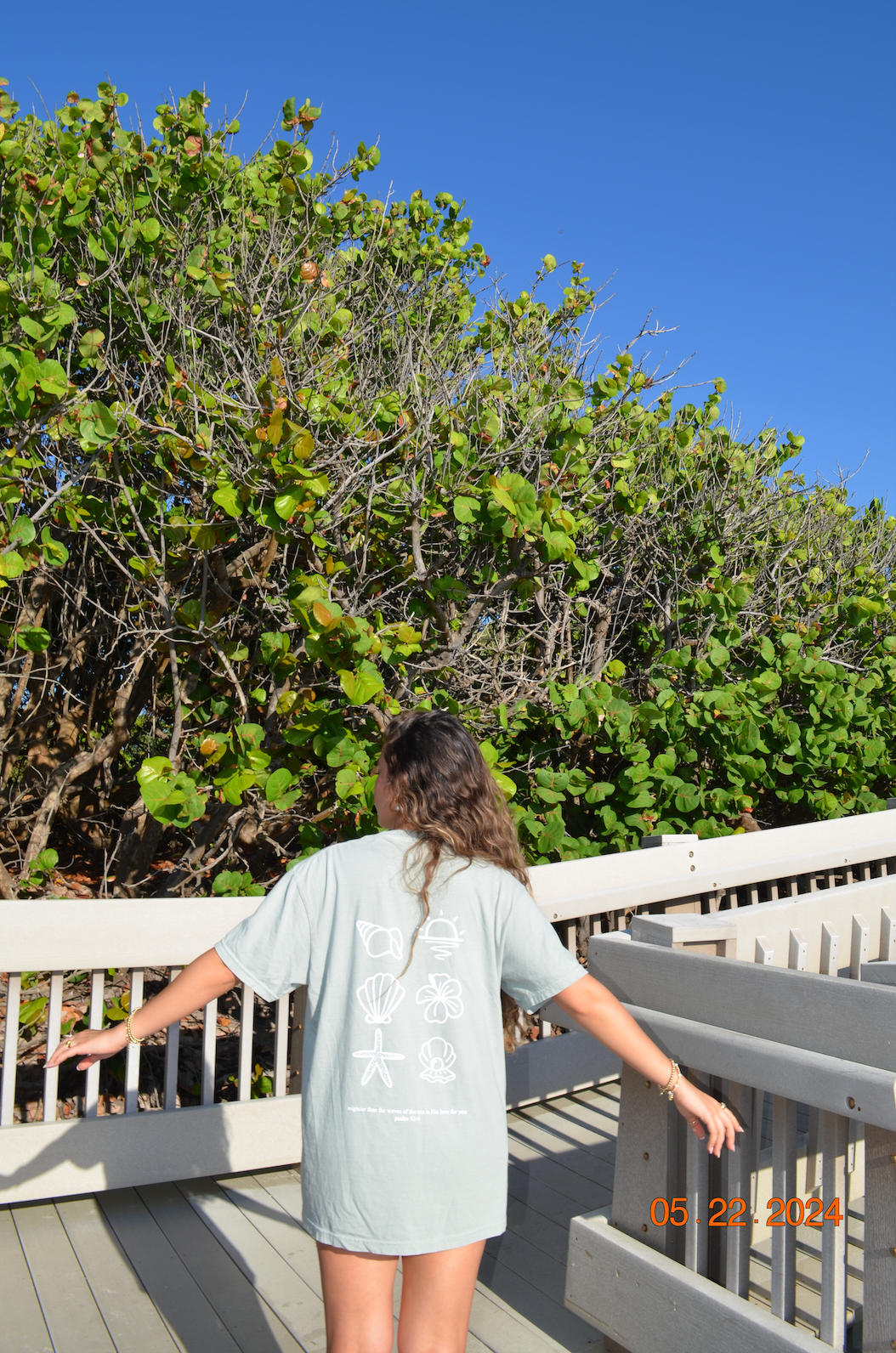 "mightier than the waves" t- shirt