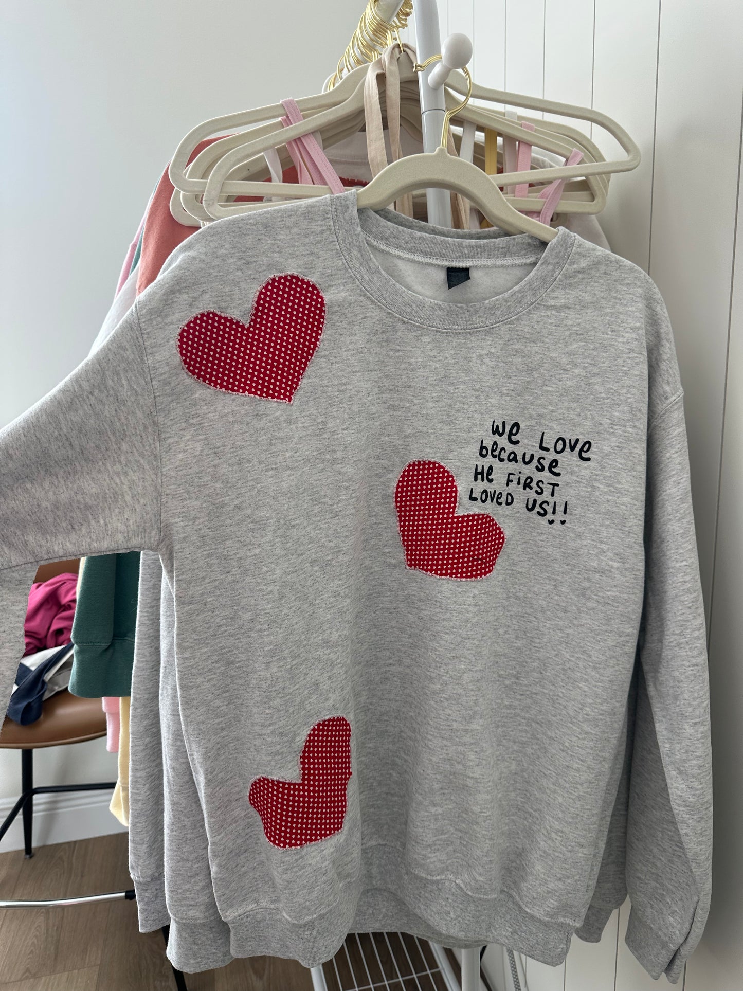 oopsie! "we love because He first loved us" crew in MEDIUM